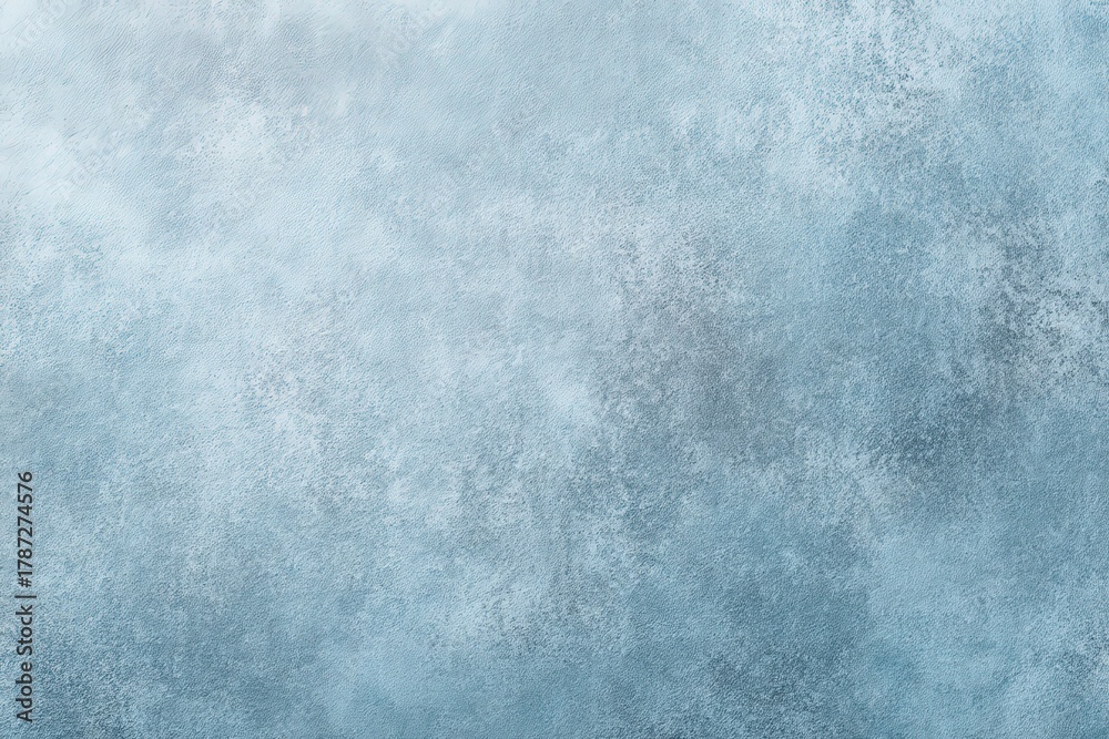 Obraz premium Powder Blue Textured Background with Gentle Gradient Wash and Soft Fabric Like Surface Finish