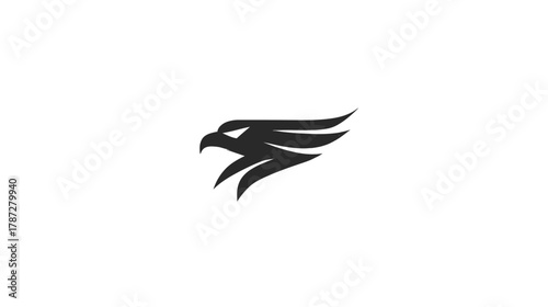 Modern stylized eagle head and wing graphic. Abstract black bird of prey symbol representing strength, freedom, and power, vector art.