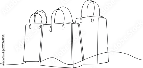 Three shopping bags in continuous line drawing style