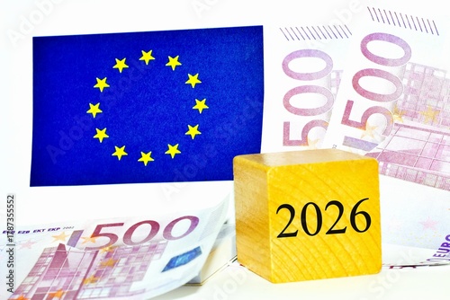 European flag with banknotes and a wooden cube showing year 2026