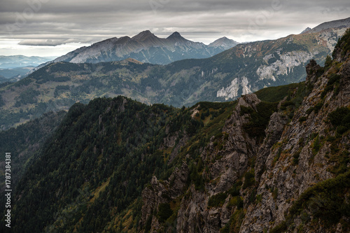 Fototapeta Naklejka Na Ścianę i Meble -  Rugged mountain landscape under cloudy sky