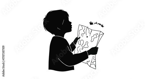 Curious child in silhouette studies a treasure map, seeking adventure and discovery.