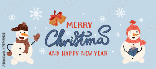 Merry Christmas and Happy New Year horizontal banner, decorated with snowman and snowgirl, snowflakes, and golden bells on a light blue background. 