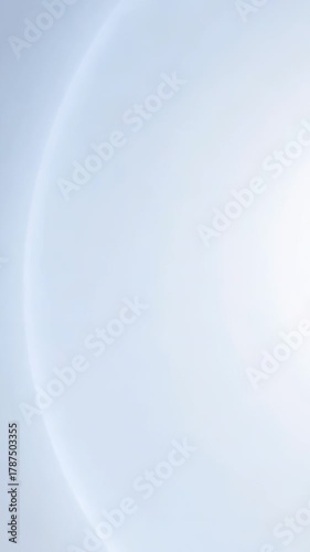 Smooth gradient animation transitions softly across pale blue and white tones creating minimal abstract background ideal for presentations or modern visual design use