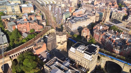 Newcastle upon Tyne: 17th Aug 2025: Aerial view showcasing Newcastle Castle, Central Station.. The bustling city landscape features historic architecture, sunny morning