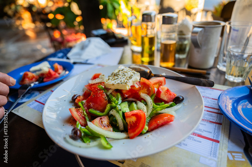 Wallpaper Mural Traditional greek salad, vegetable (tomato,green pepper,onion) with white cheese and olive oil. Torontodigital.ca