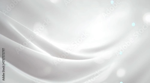 Soft white silk satin fabric textile texture background with smooth flowing wave design