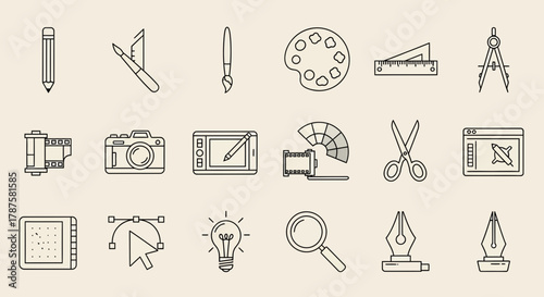 Artistic tools showcase creativity with graphic tablet, pencil, camera, paintbrush, paint palette, ruler, scissors and film for drawing and design