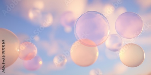 Abstract image featuring multiple soft, translucent spheres or bubbles floating against a bright, airy background with peach and light lilac pastel colors, creating a dreamy and ethereal texture