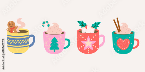 Christmas hot chocolate mugs with gingerbread candy and festive winter decorations