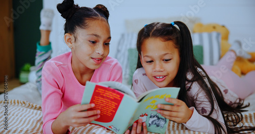 Obraz na płótnie Children, relax and reading book on bed with love, care and learning for bonding in home