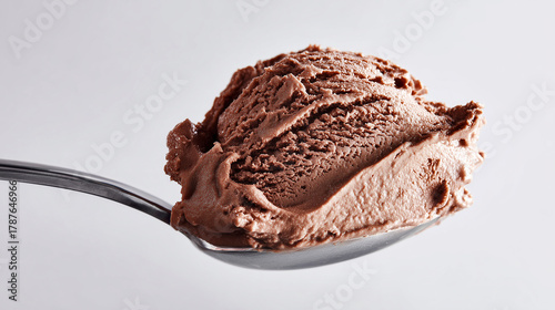 Chocolate Ice Cream Scoop on Silver Spoon