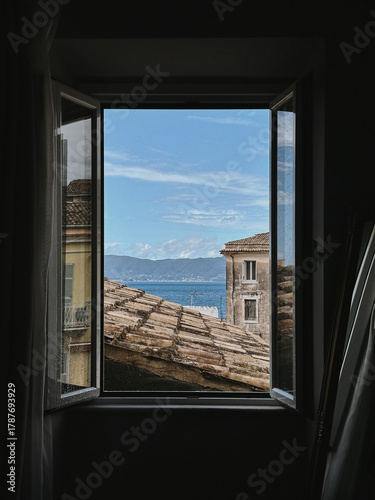 View of Sea Through Open Window