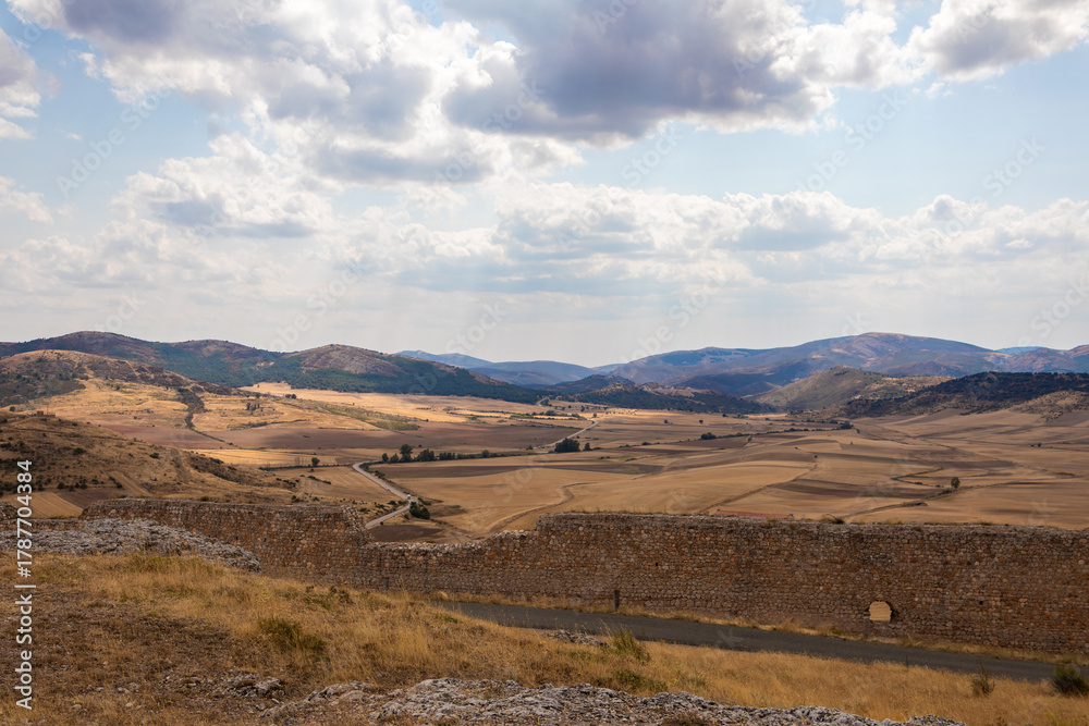 Fototapeta premium Exploring the scenic landscapes of Atienza, Guadalajara in Spain under a partly cloudy sky