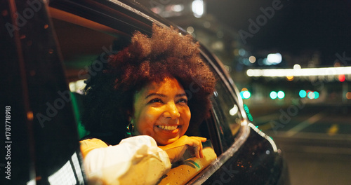 Fotografia African woman, window and car at night for travel, sightseeing city and tourism holiday