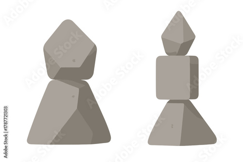 Two balanced stone cairns with textured geometric shapes isolated on white