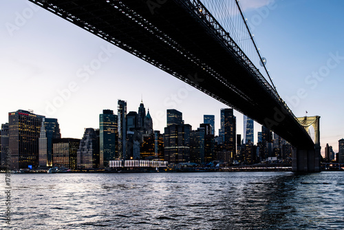 Photography Manhattan downtown financial district across east river at sunset