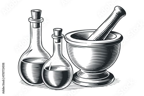 Glass flasks and mortar with pestle for potion making