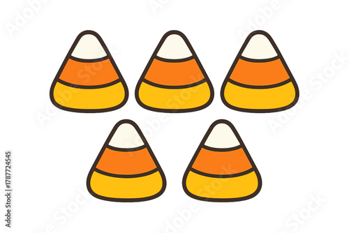 Five pieces of tri-colored candy corn arranged in a decorative pattern