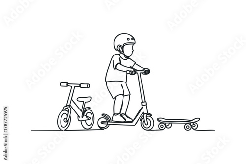 Boy on scooter with bicycle and skateboard