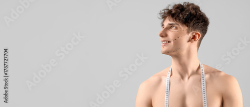 Young man with markings on ...