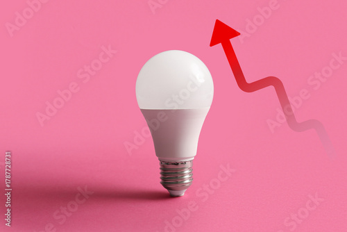 Modern light bulb on pink b...