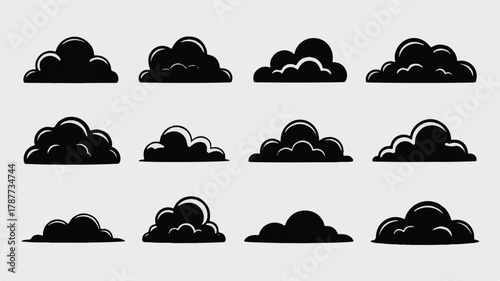 A collection of twelve stylized black cloud shapes, each with a unique form and soft, rounded edges, creating a serene atmosphere