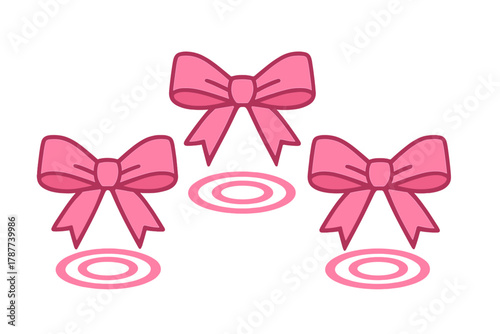 Three pink decorative gift bows with concentric circle accents