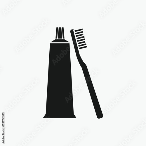 Toothpaste tube and toothbrush icon vector