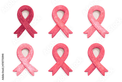 Assorted pink awareness ribbons displayed in a repeating decorative pattern