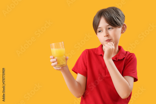 Thoughtful little boy with ...