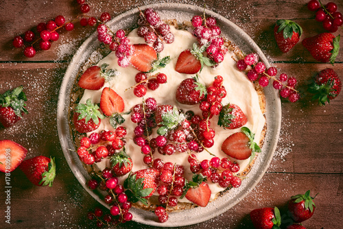 crepes with berries and whipped cream in plate