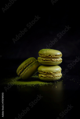 Japanese Matcha Macarons on Black Marble Background. Japanese French Fusion Cuisine.