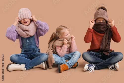 Cute children in winter clo...