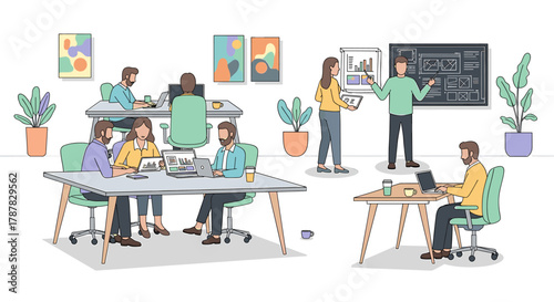 People working collaboratively in a modern office space, using laptops and discussing ideas near a blackboard.