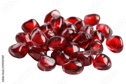 Jewel-toned Pomegranate Seeds: A close-up showcases a pile of glistening, ruby-red pomegranate seeds, each a tiny burst of flavor, offering a glimpse of the fruit's vibrant heart.
