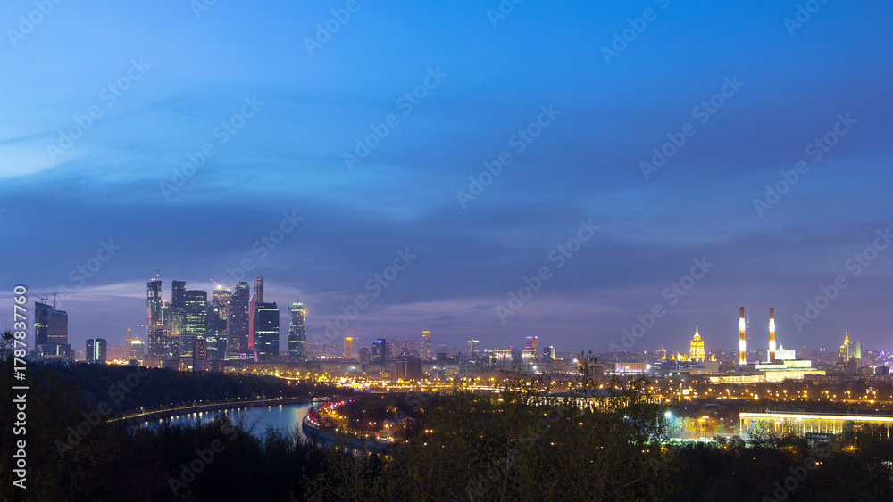 Fototapeta premium Panoramic aerial view of Moscow City, Russia, from Sparrow Hills day to night timelapse