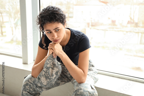 Sad female African-American...