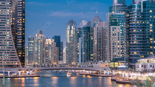 Photography Dubai Marina towers and canal in Dubai day to night timelapse