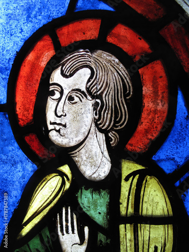 Medieval stained glass window panel of St Peter one of the twelve apostles of  Jesus Christ and the leader of the Christian church dating from 1280AD and originally from Sees Cathedral in France