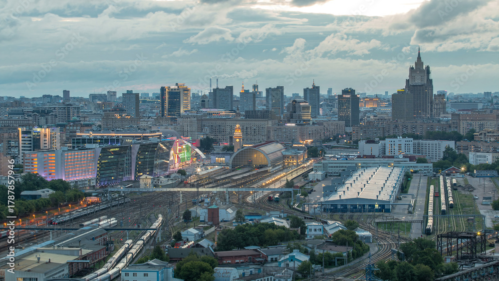 Obraz premium Panoramic view to Kiev Railway Station night to day timelapse and modern city in Moscow, Russia