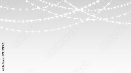 Garland with glowing LED lights and festive decorations for Christmas holiday party stage.
