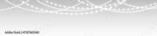 Garland hanging christmas holiday festive bulbs glowing lights and ribbon decoration banner.

