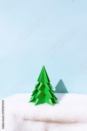 Origami paper winter tree. Handmade concept. Creative idea.