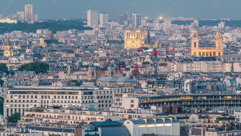 Obraz premium Aerial panorama above houses rooftops in a Paris day to night timelapse