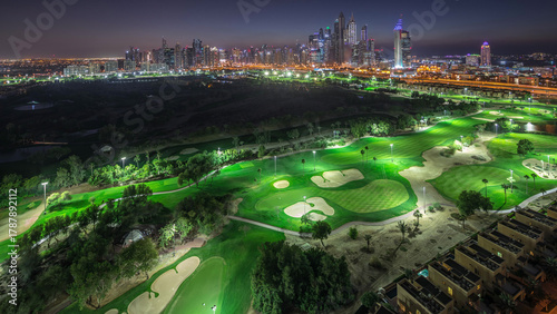 Canvas Print Dubai Marina skyscrapers and golf course day to night timelapse, Dubai, United A