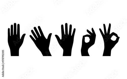 Collection of black hand silhouettes showing different gestures
