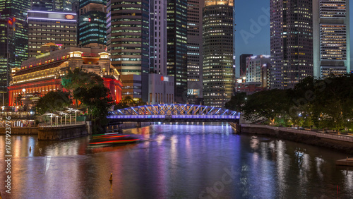 Photography Singapore skyscrapers skyline with white Anderson Bridge near esplanade park day to night timelapse