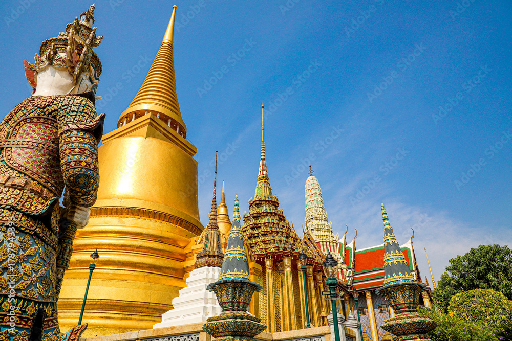Fototapeta premium Wat Phra Kaew or Wat Phra Sri Rattana Satsadaram is temple used for various royal ceremonies during reign of King Rama I. It is temple within the Grand Palace. Inside temple is the Emerald Buddha.