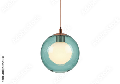 Isolated modern teal glass pendant light, hanging from ceiling with copper base and cord, indoors